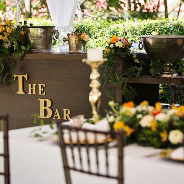 pexels-photo-1605417-1605417 Charming outdoor bar decorated with flowers, perfect for events and receptions.